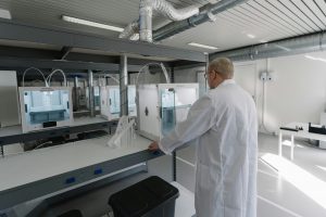 biomedical engineer looking at the equipment